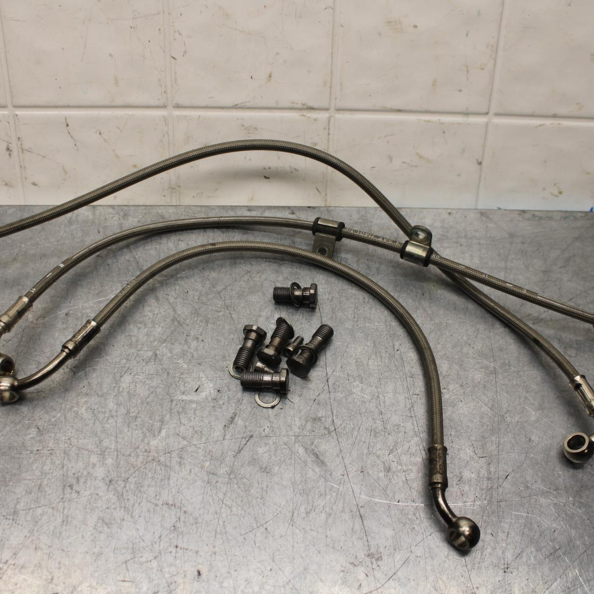 2009 Triumph Daytona 675 FRONT BRAKE CALIPER HOSES LINES BB584