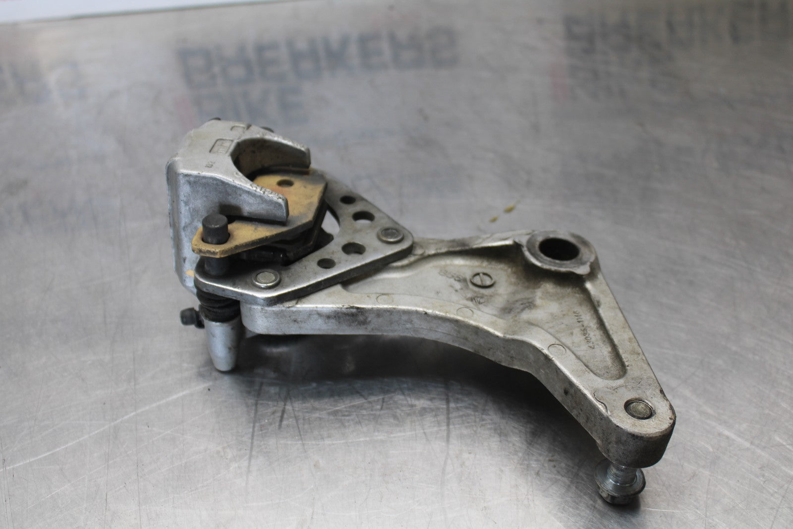 03-08 KAWASAKI VULCAN 1600 REAR BACK BRAKE CALIPER W MOUNT BRACKET BB196