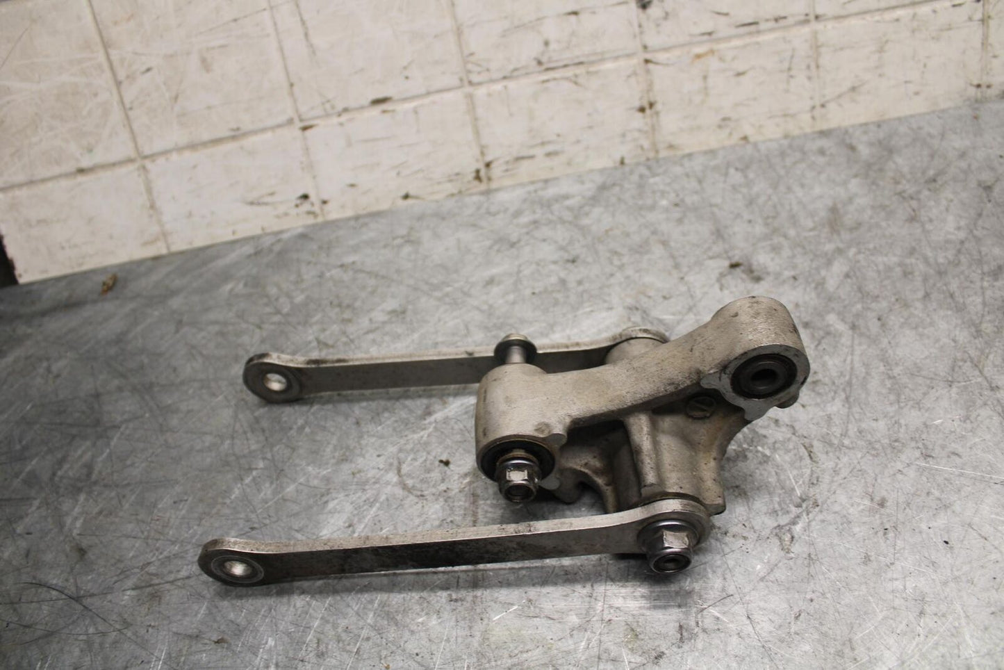 2009 Kawasaki Ninja ZX6R ZX600R REAR DOGBONE SHOCK LINKAGE LINK BB538