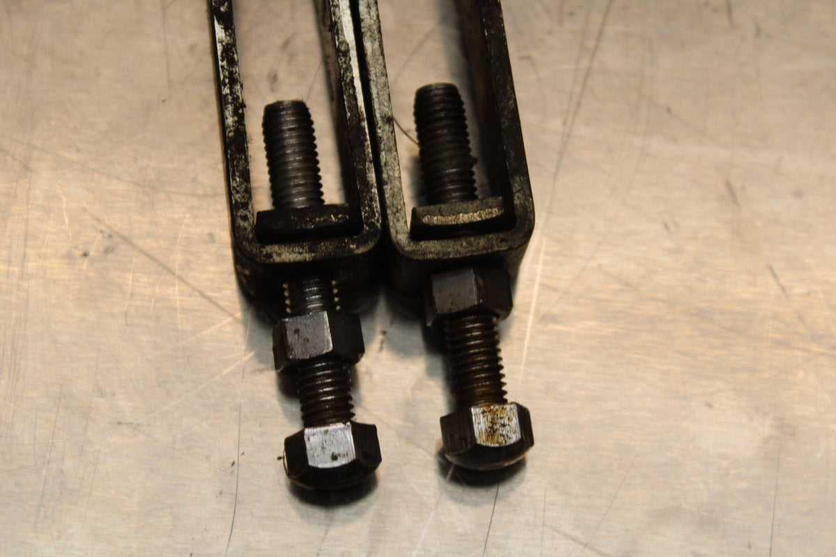 86 SUZUKI GS750ES SWINGARM CHAIN TENSIONER ADJUSTMENT BRACKETS  BB140