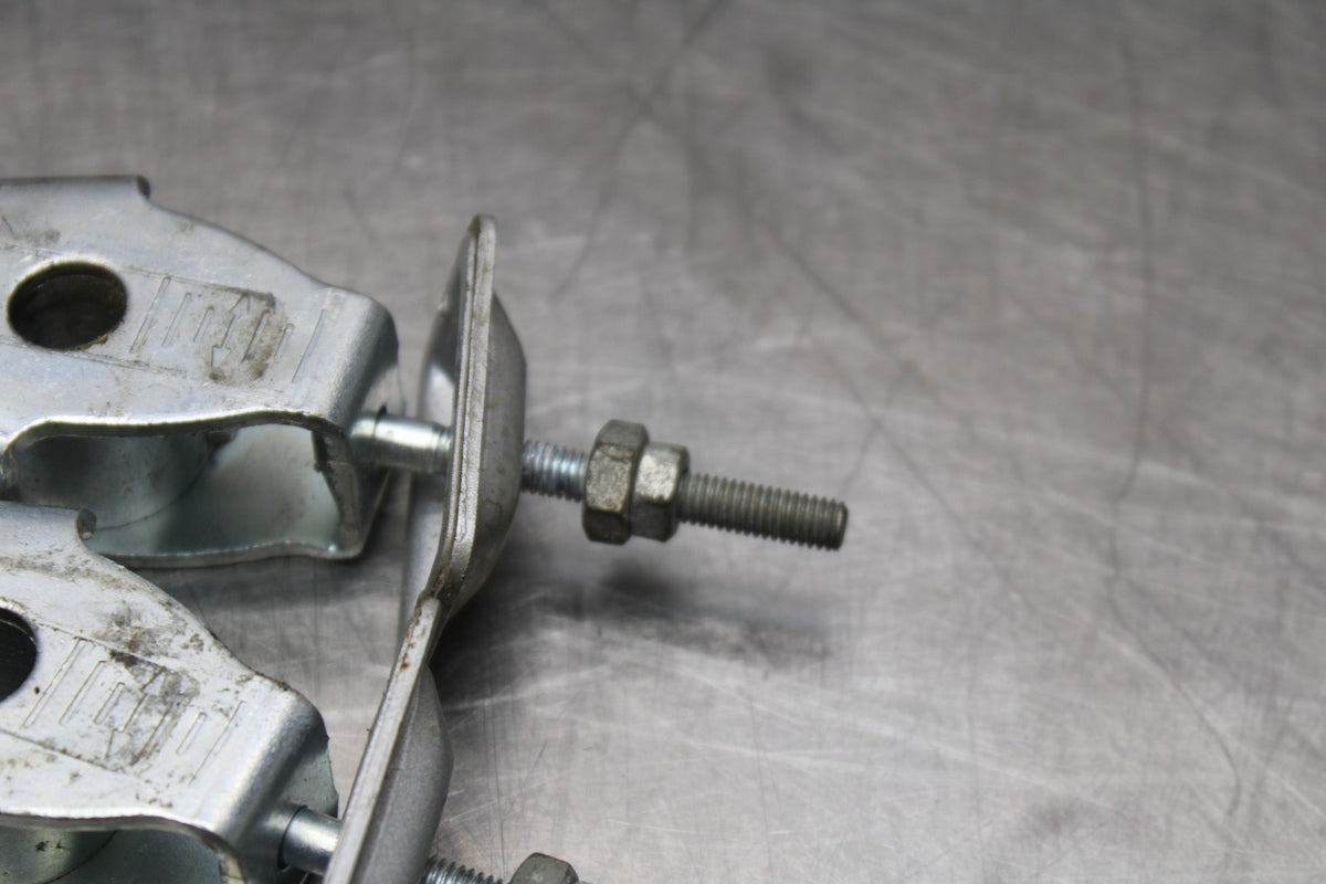08 HONDA CBR125R SWINGARM CHAIN TENSIONER ADJUSTMENT BRACKETS  BB839