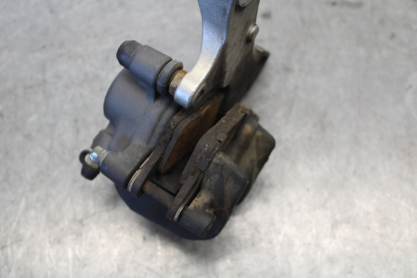 07-12 HONDA CBR600RR REAR BACK BRAKE CALIPER W MOUNT BRACKET