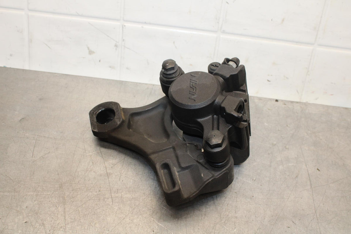 2009 Triumph Daytona 675 REAR BACK BRAKE CALIPER W MOUNT BRACKET BB584