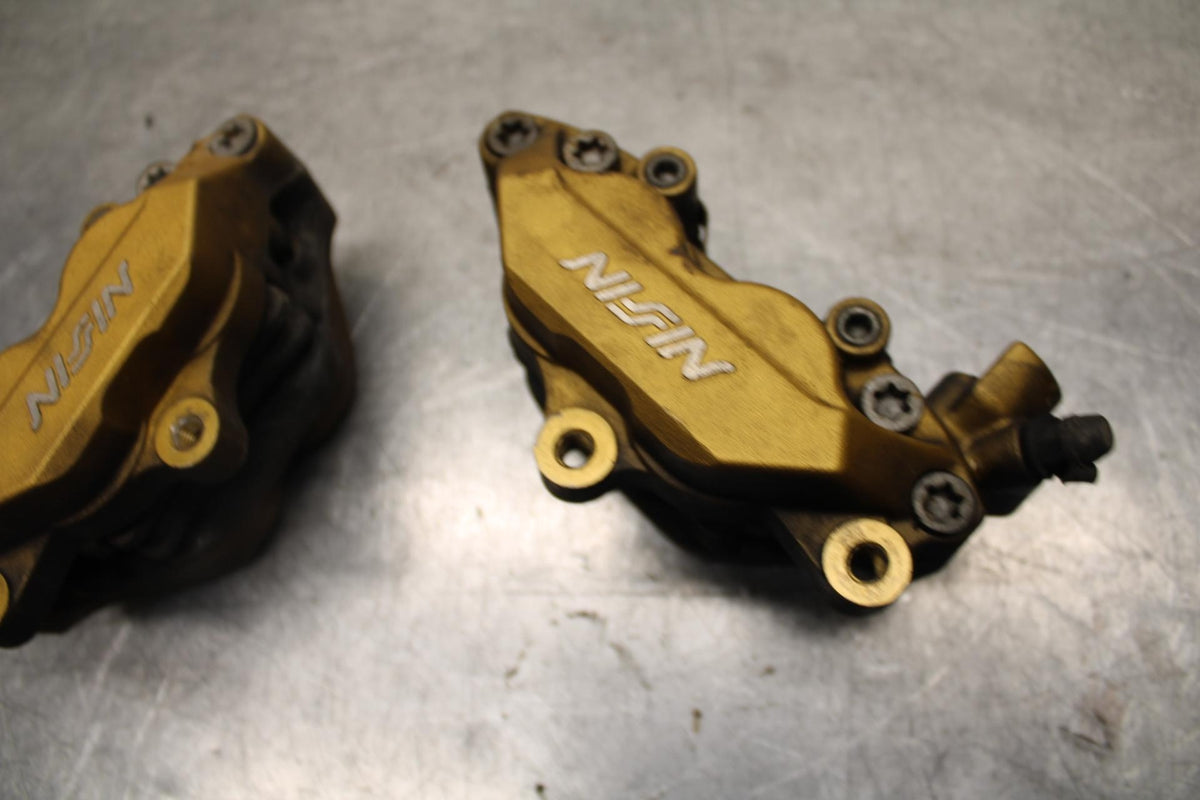 03-04 HONDA CBR600RR RIGHT LEFT FRONT BRAKE CALIPER SET PAIR CALIPERS BB614