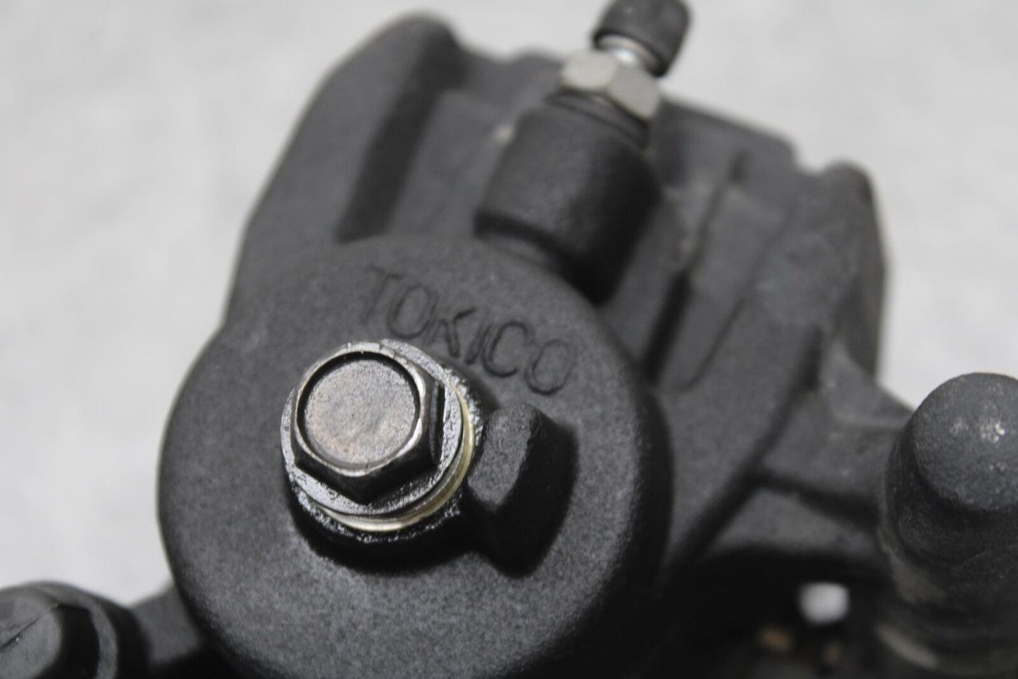 09-12 KAWASAKI NINJA ZX6R REAR BACK BRAKE CALIPER W MOUNT BRACKET  BB640