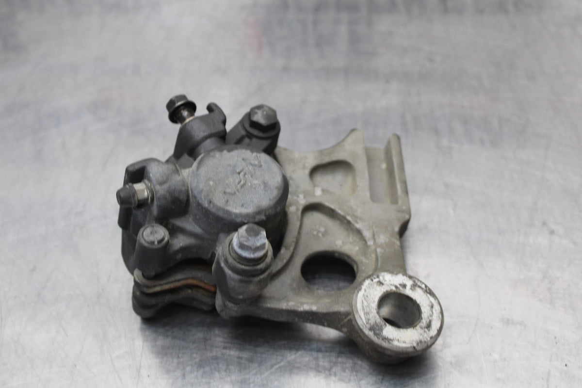 01-06 HONDA CBR600F4I REAR BACK BRAKE CALIPER W MOUNT BRACKET BB185