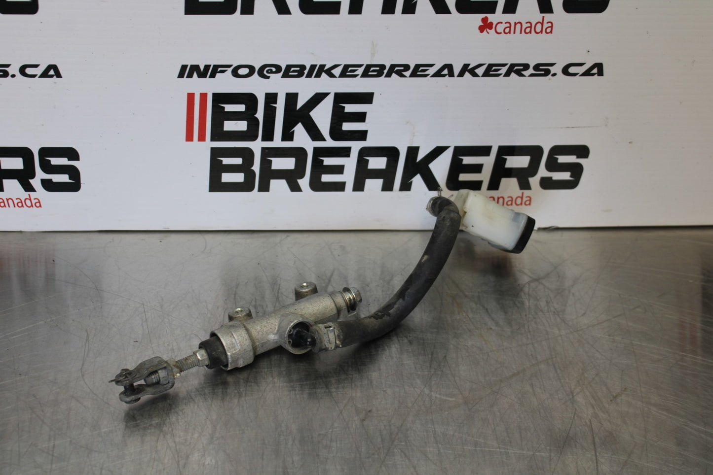 06-07 SUZUKI GSXR 600 REAR BACK BRAKE MASTER CYLINDER W RESERVOIR BB170