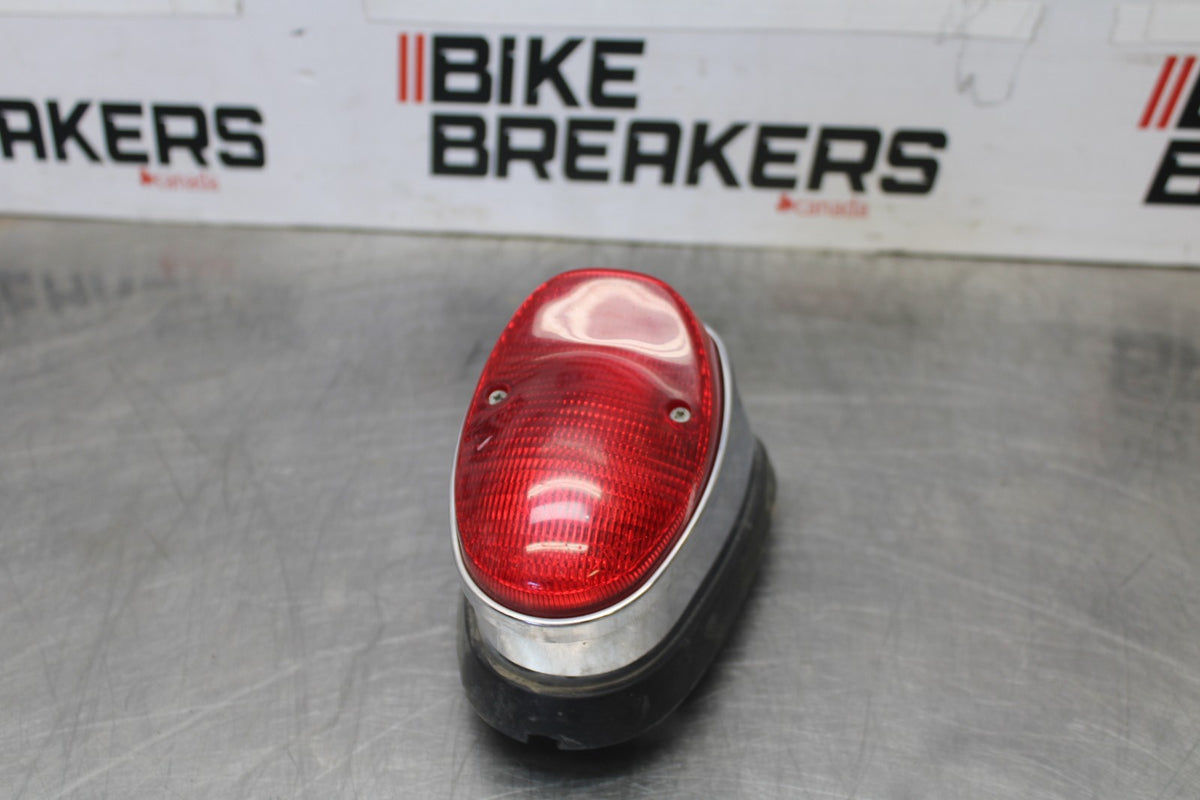 08 KAWASAKI VULCAN 1600 VN1600D NOMAD TAILLIGHT REAR TAIL BRAKE LIGHT BB904