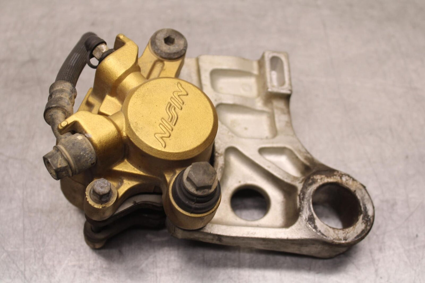 03-04 HONDA CBR600RR REAR BACK BRAKE CALIPER W MOUNT BRACKET  BB628