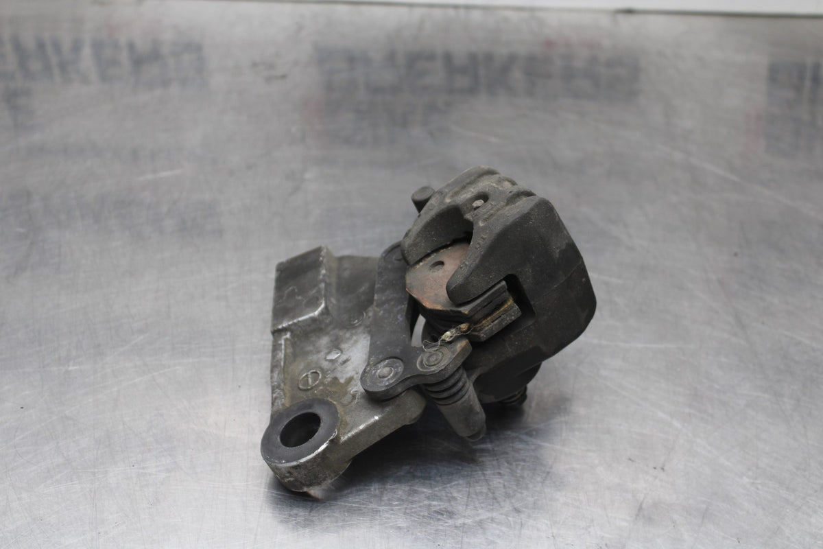 06 KAWASAKI Z750 REAR BACK BRAKE CALIPER W MOUNT BRACKET BB837