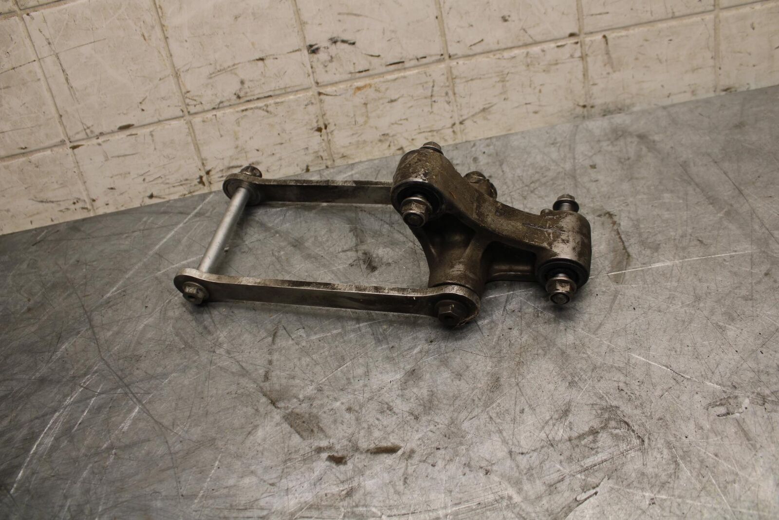 2005 Kawasaki Ninja ZX6R ZX636C REAR DOGBONE SHOCK LINKAGE LINK BB534